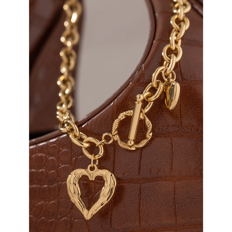 The Heart's Embrace: A Golden Collar Necklace